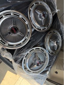 65 impala SS hubcaps