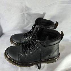 Woman With Bouncing Black Boots