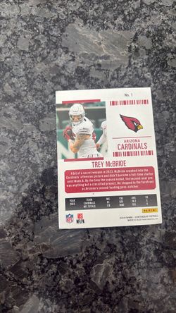 Trey McBride and saquon Barkley card