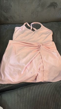 Pink jumpsuit with skirt cover