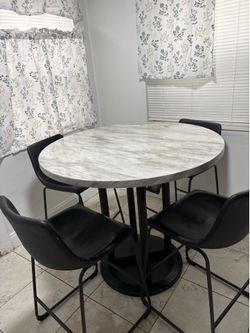 Round Marble Look Table and 4 Black Chairs Set