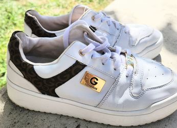 GBG Los Angeles White Sneakers with Gold Accents and Brown Patterned Heel Trim