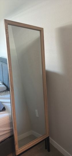 5 feet tall mirror with wooden frame and stand