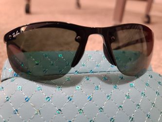 2 pair of ray ban sunglasses. missing a screw. the lenses of the metal framed pair are slightly scratched.