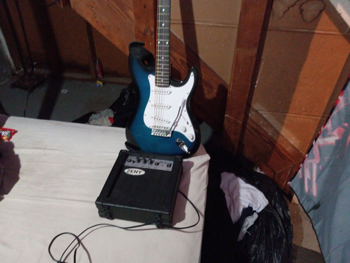 A Guitar And A Guitar Amplifier
