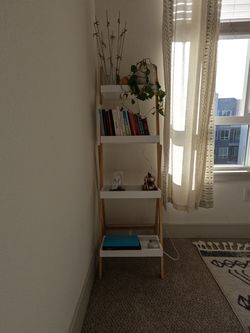 Light-wood four-tier ladder bookcase