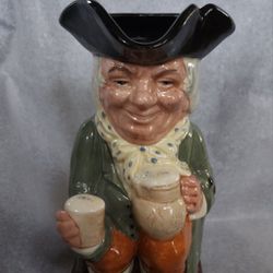 Royal Doulton Toby Mug Pitcher "Happy John" EUC $48 
Excellent Condition 
Pitcher with handle
8-1/2 inches tall 
Made in England