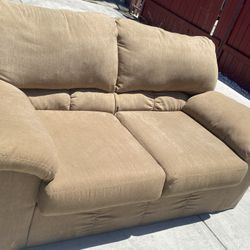 Ashley’s furniture Love seat couch sofa 2 seater Light Brown Great condition