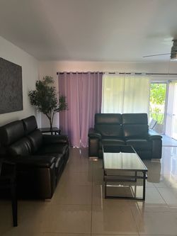 leather recliner sofas with tables in excellent condition $1.200