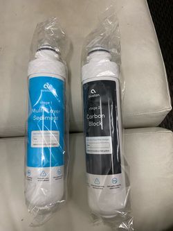 Avalon genuine replacement filters for bottleless water coolers, featuring a stage 1 sediment filter and a stage 2 carbon block filter.
