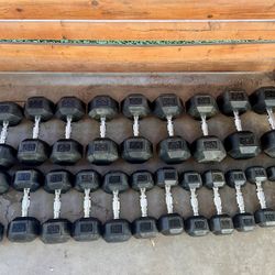 5-65lb rubber coated dumbbell set. 910 total lbs