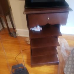 rollaway newspaper shelf antique