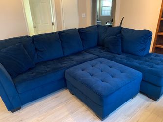 Large blue velvet couch