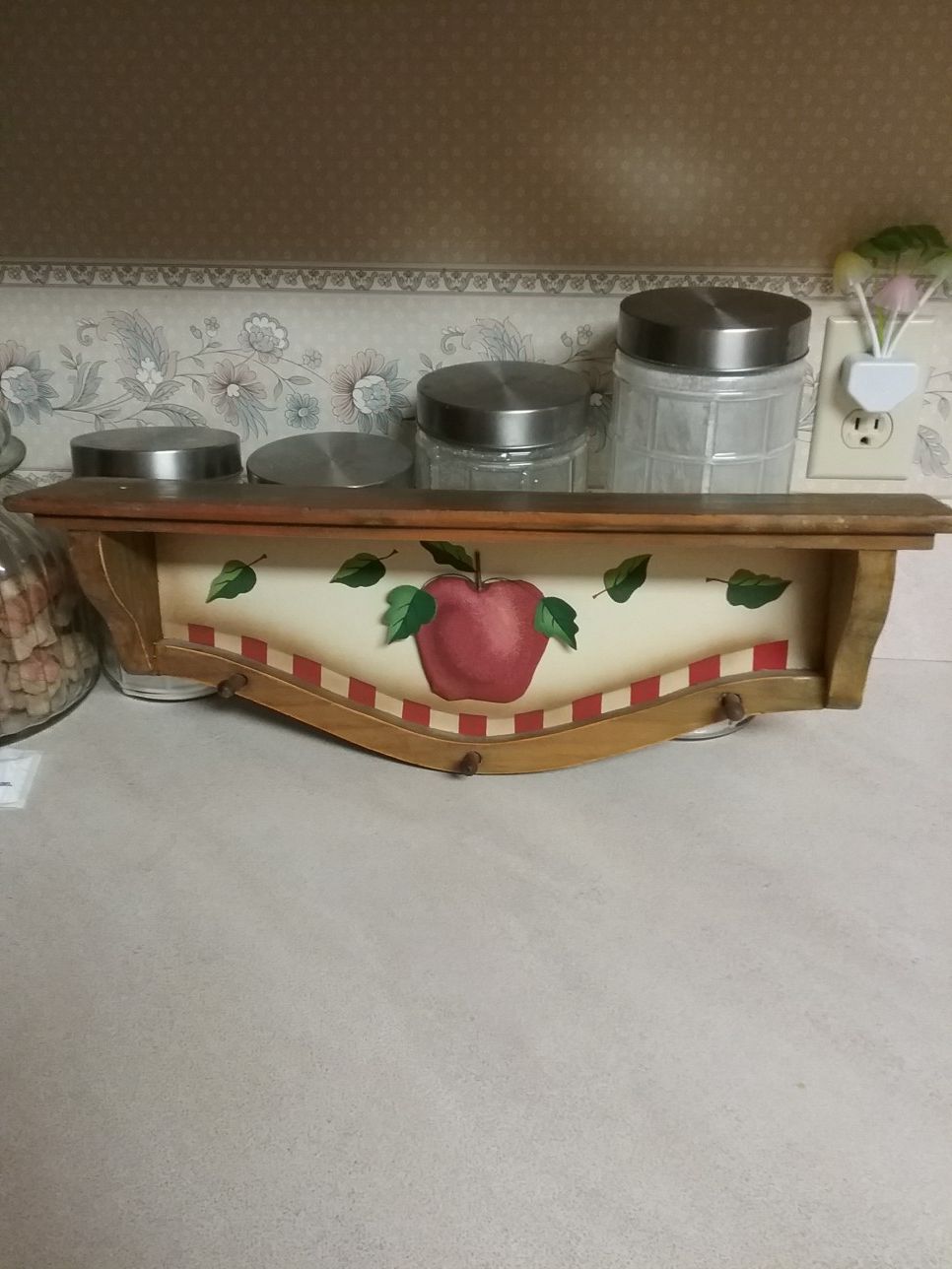 Shelf...Apple raised in the middle