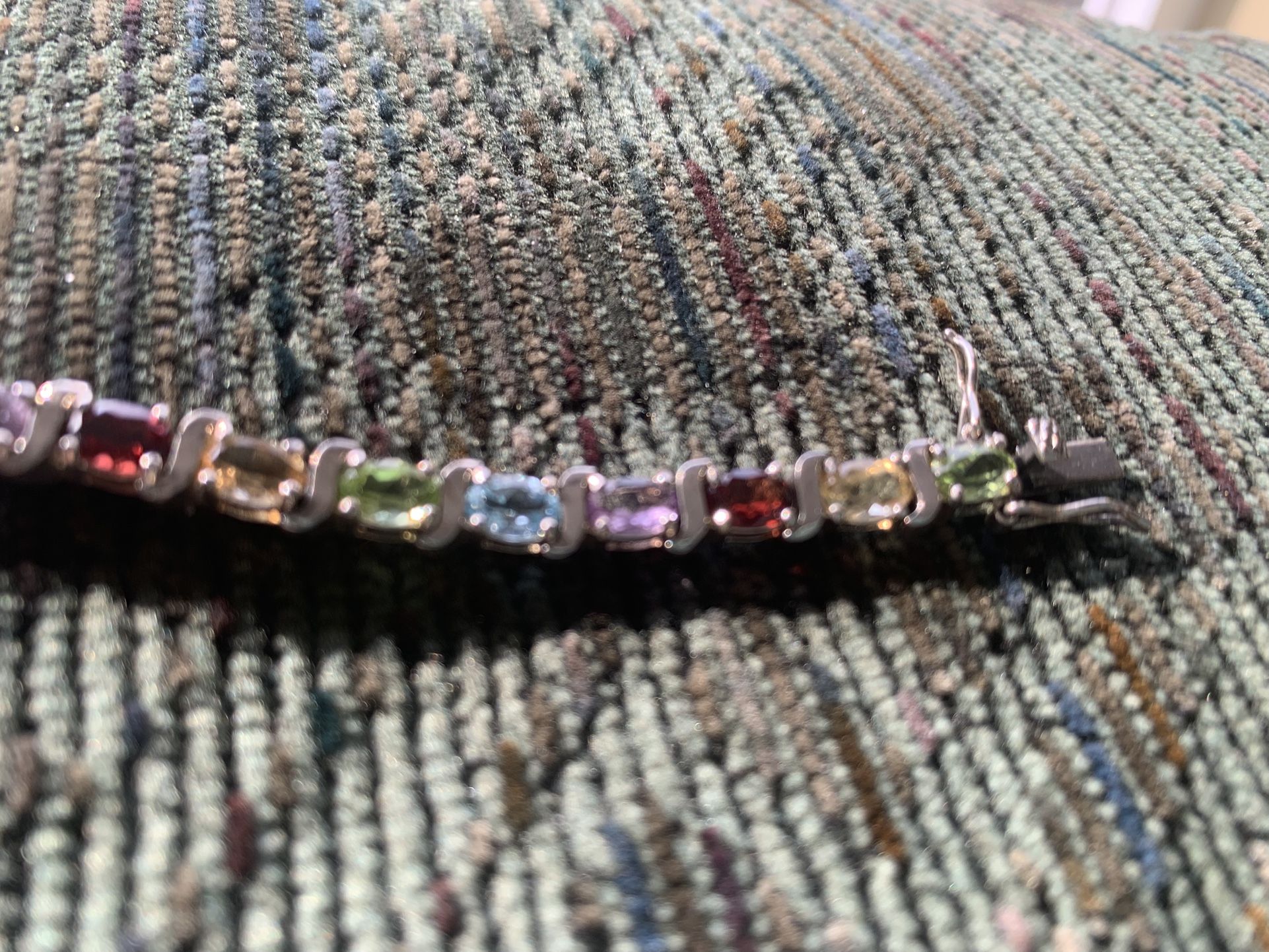 925 HNA stamp, silver, and colored stone bracelet