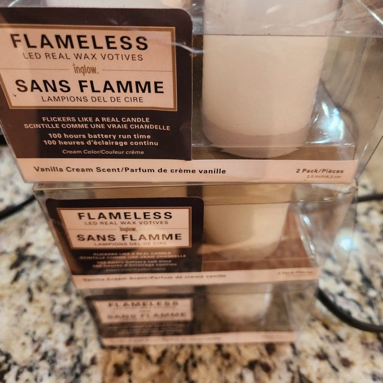 3 (2) flamless battery Operated votive candles.