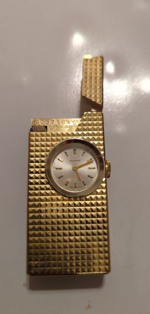 Bucherer Swiss Lighter And Clock
