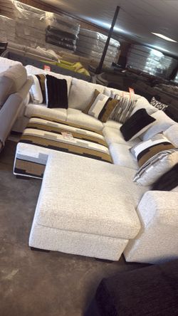 Brand new sectional 1499 cocktail ottoman 299