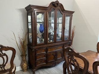 Dark wood china cabinet