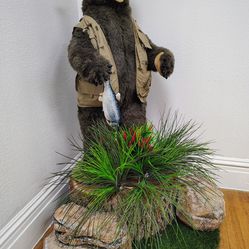 Bear 5 ft tall with artificial rocks