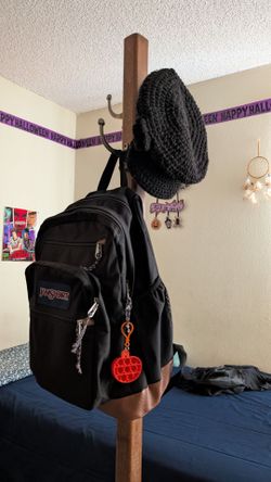 A Coat Rack with Metal Hooks