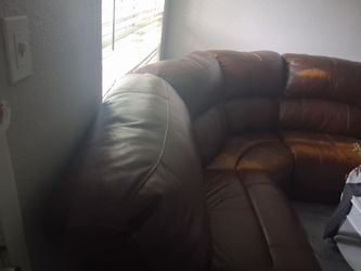 Large leather sec.  With recliner