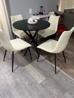 BEAUTIFUL SMALL BLACK TABLE AND 4 CHAIRS, IN EXCELLENT CONDITION