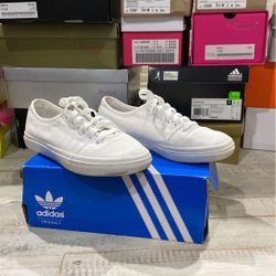 lightly used adidas shoes .