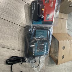 New Makita battery 18 V 3 .0Ah and Charge Makita DC18SD