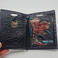 Vintage crocodile leather wallet Thailand map wallet. Perfect shape, like 
new,  no tags It is 5" x 3 75" while folded.
Weight 4oz plus shipping mater