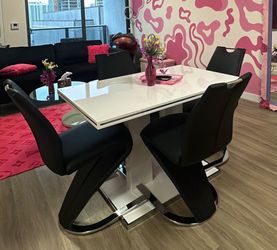 White Gloss Dining Table with 4 Black Chairs