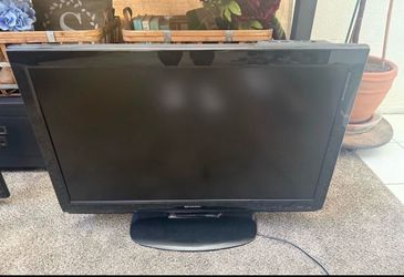 30 inch sharp tv comes with remote