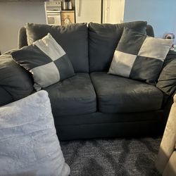 Suede Sofa And Recliner With 2 Matching Pillows.  