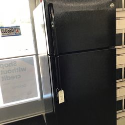 GE 16 Cu Ft Top And Bottom Fridge. 1 year Warranty 