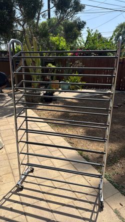Chrom and black shoe rack on wheel wheels