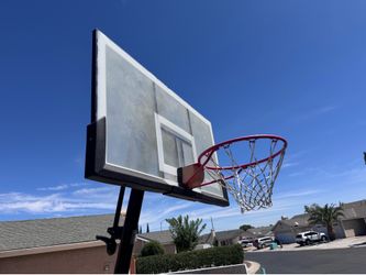 Adjustable portable basketball hoop