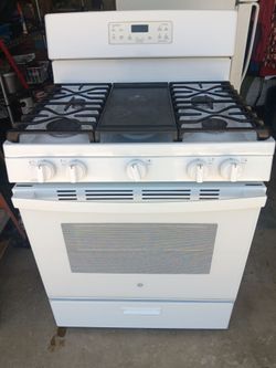 GE 5 GAS STOVE CENTER GRIDDLE (CLEAN)