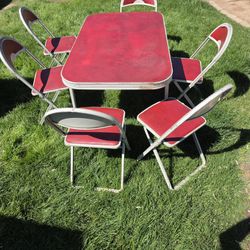 Vintage metal table and chairs