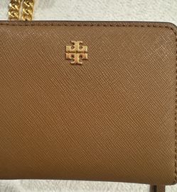 Authentic Tory Burch wallet, if it’s posted it’s available.See map for pick up.Only contact 4 pickup