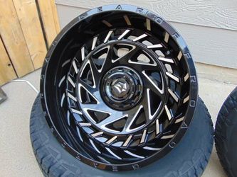 4 New 20X12 Gloss Black/Milled Rims & LT 33 14.50 20 TIS M/T 12ply Tires 6X5.5 & 6X135 44MM Offset