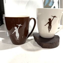 Pair of Storyville Coffee Company "Flyboy" mugs 12 oz  - One Brown / One White - price for pair $12