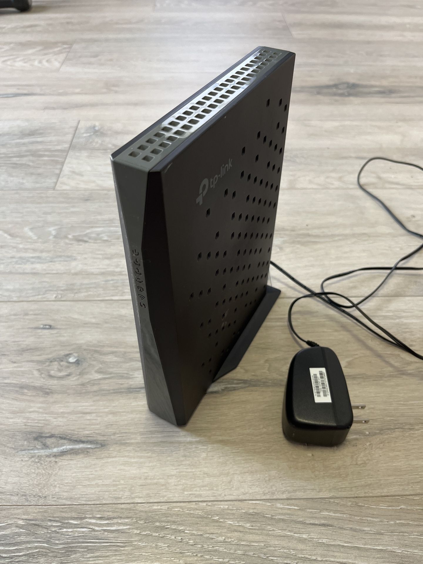 The TP-LINK Archer CR500 Dual Band Modem Router