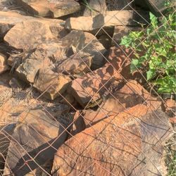 Rock Several Large And 1-2 Pallets Left Of The Smaller Rock