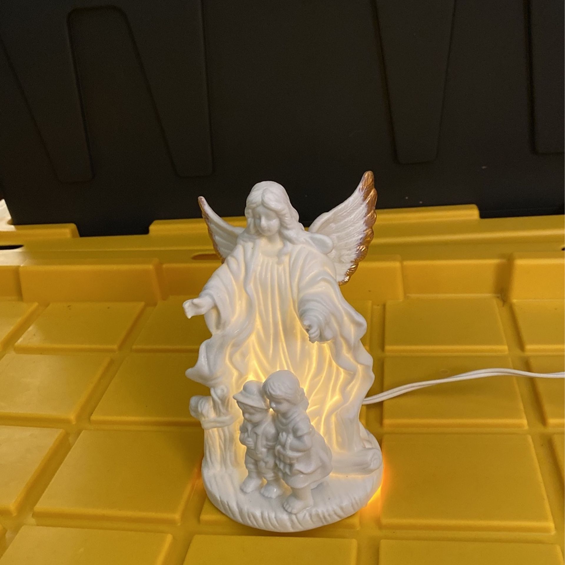 Angle Statue With Light