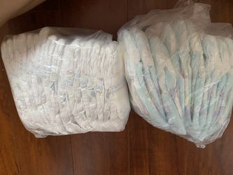Size 2 and 3 diapers Pampers and Huggies brand $10