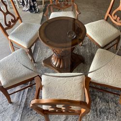 52: table stand and 6 chairs