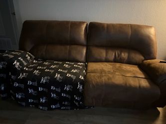 Brown reclining couch
