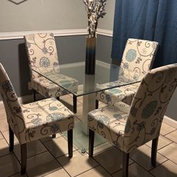 Glass Table With 4 Floral Chairs 