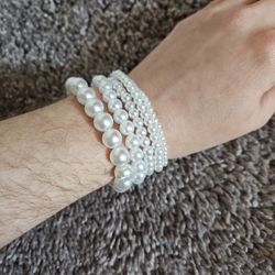 2 Packages Of Pearl Bracelets 