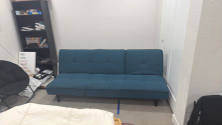 Blue futon moveable